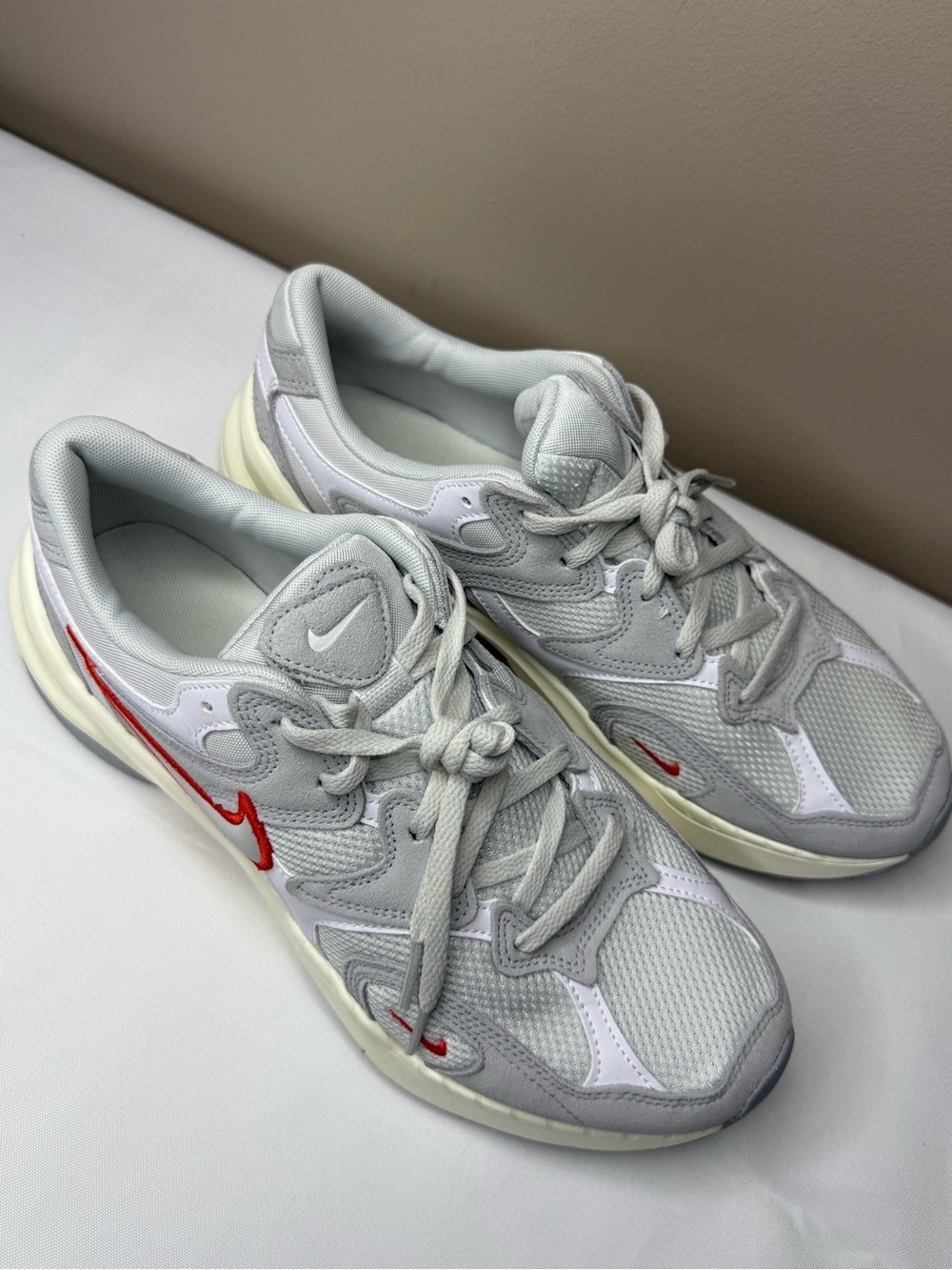 Nike Light Gray Mesh Sneakers with Red Swoosh